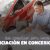 financiación de autos en concesionarias: vendedor y cliente revisando una cuota en el salón